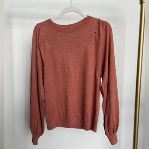 Blush pullover sweater with shoulder and sleeve detail